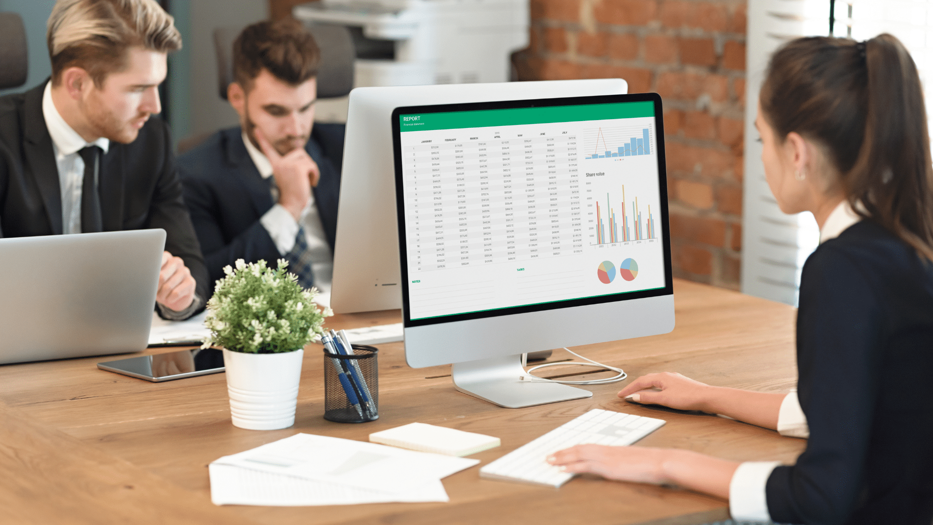 An image of three CPAs at a local Accounting Services Firm in Ottawa