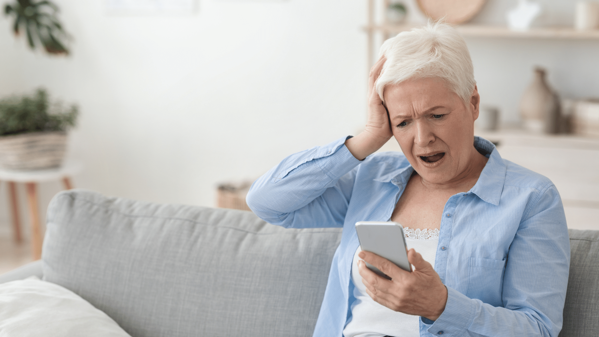 An image of an elderly lady who just realized she was a victim of one of the latest CRA Scams