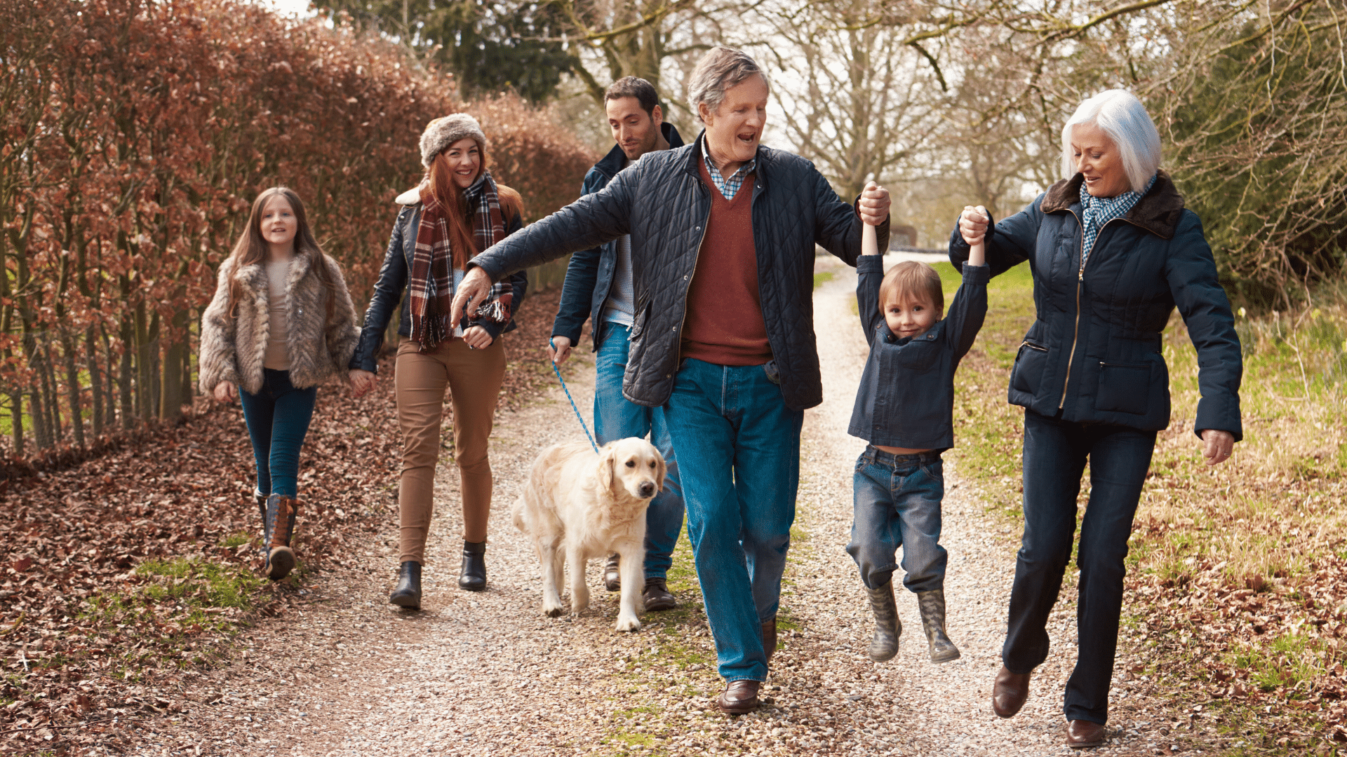 An image of a multi-generational family out for walk