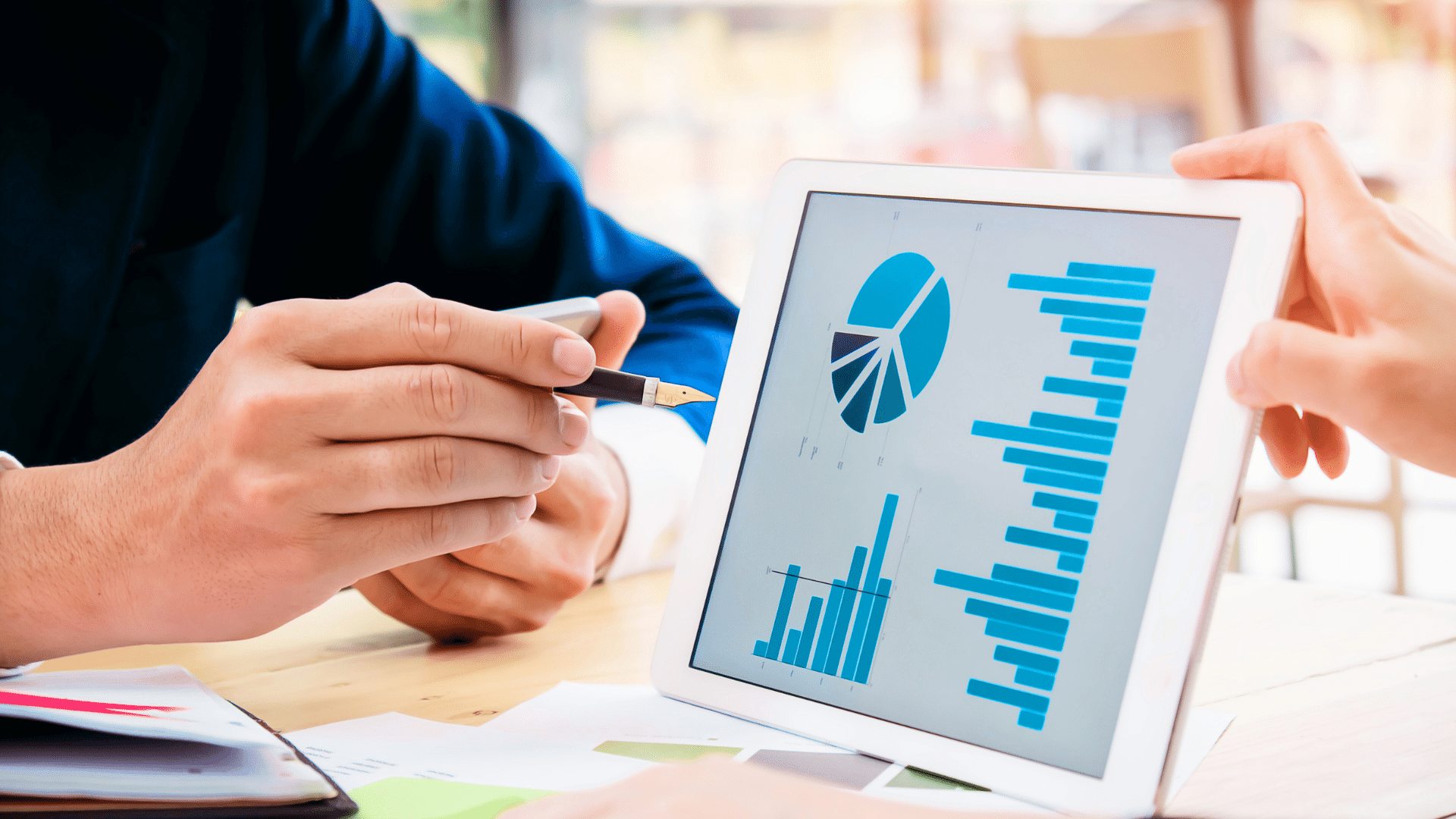 An image of an Ottawa small business owner reviewing a competitive analysis for their startup