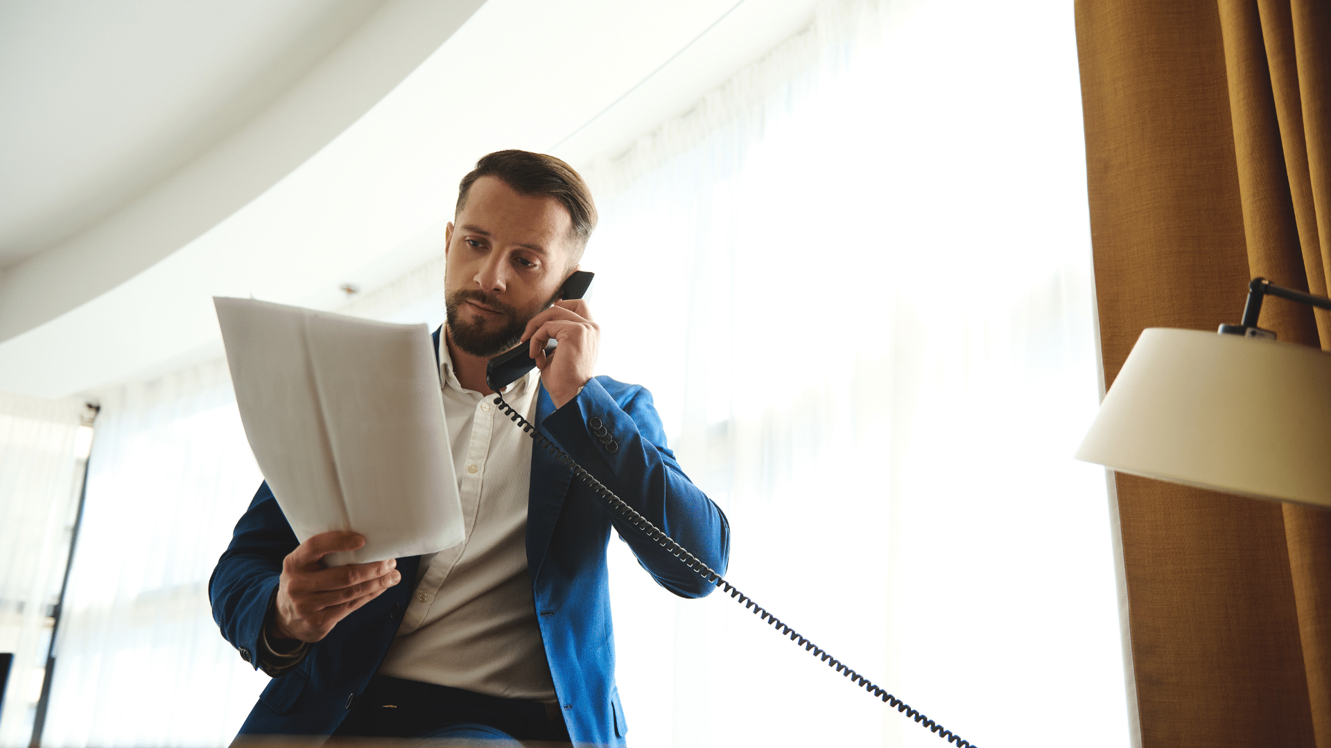 An image of a small business owner in Ottawa speaking with their local CPA firm to discuss some unexpected cost in their small business.